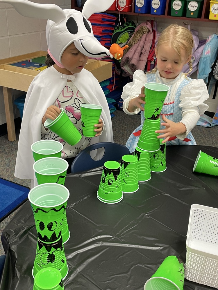 Kids doing Halloween activities.