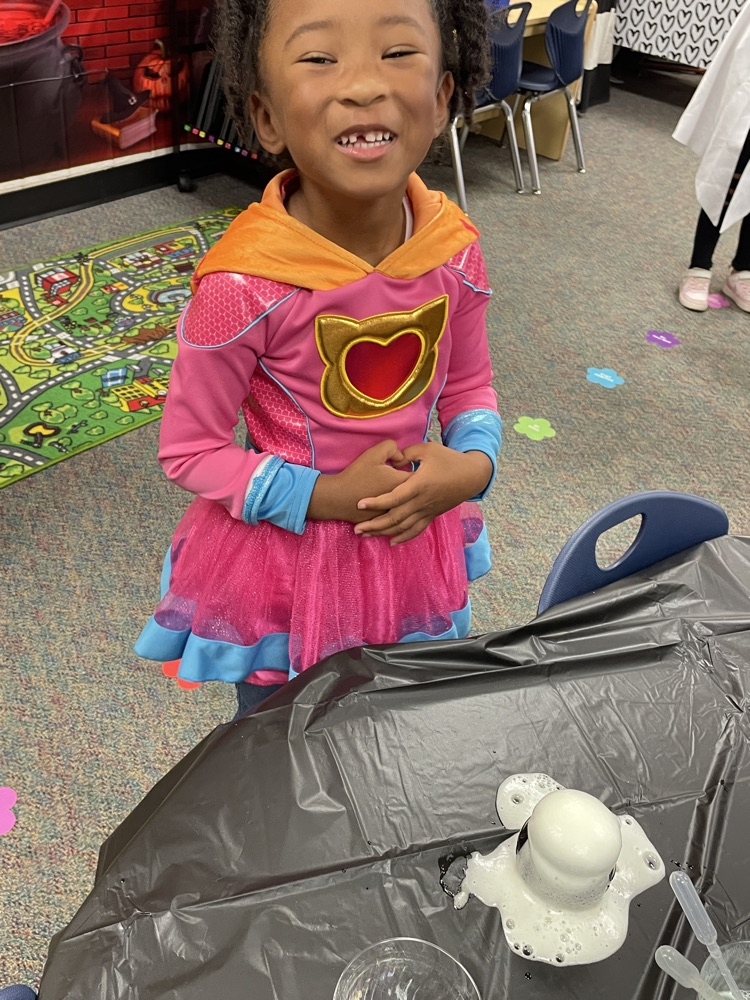 Kids doing Halloween activities.