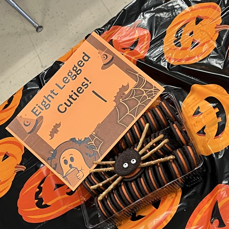 kindergarten students completing Halloween academic activities