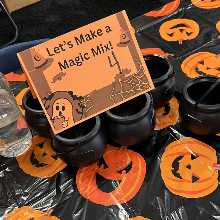 kindergarten students completing Halloween academic activities