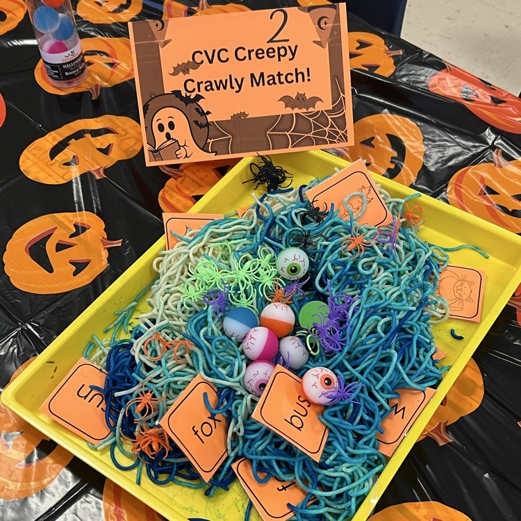 kindergarten students completing Halloween academic activities