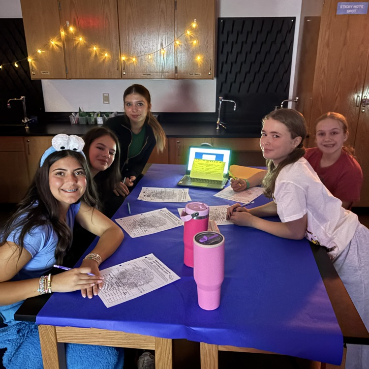 students completing a science activity 