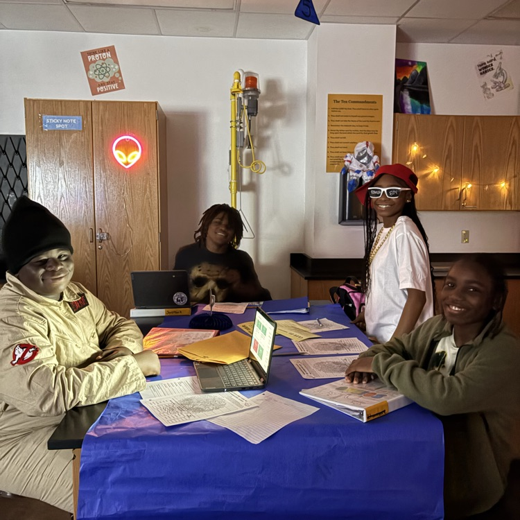 students completing a science activity 