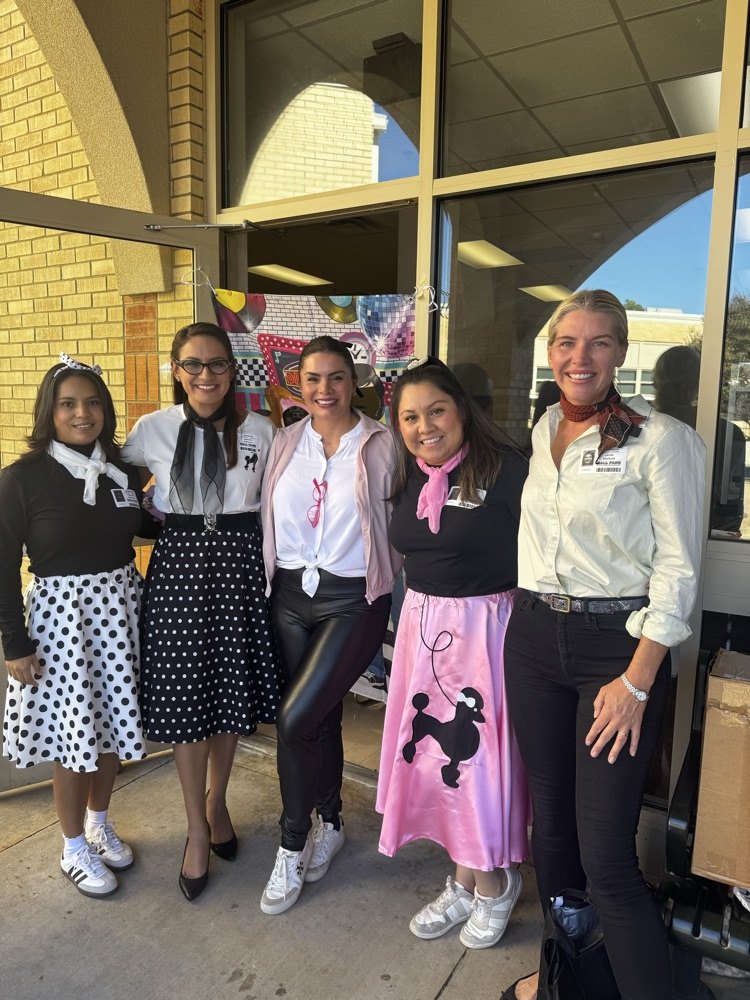 dressed in 50’s clothes