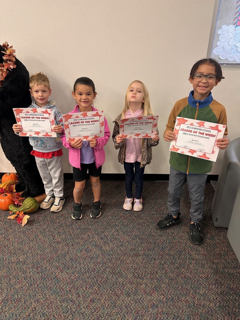 students holding certificates