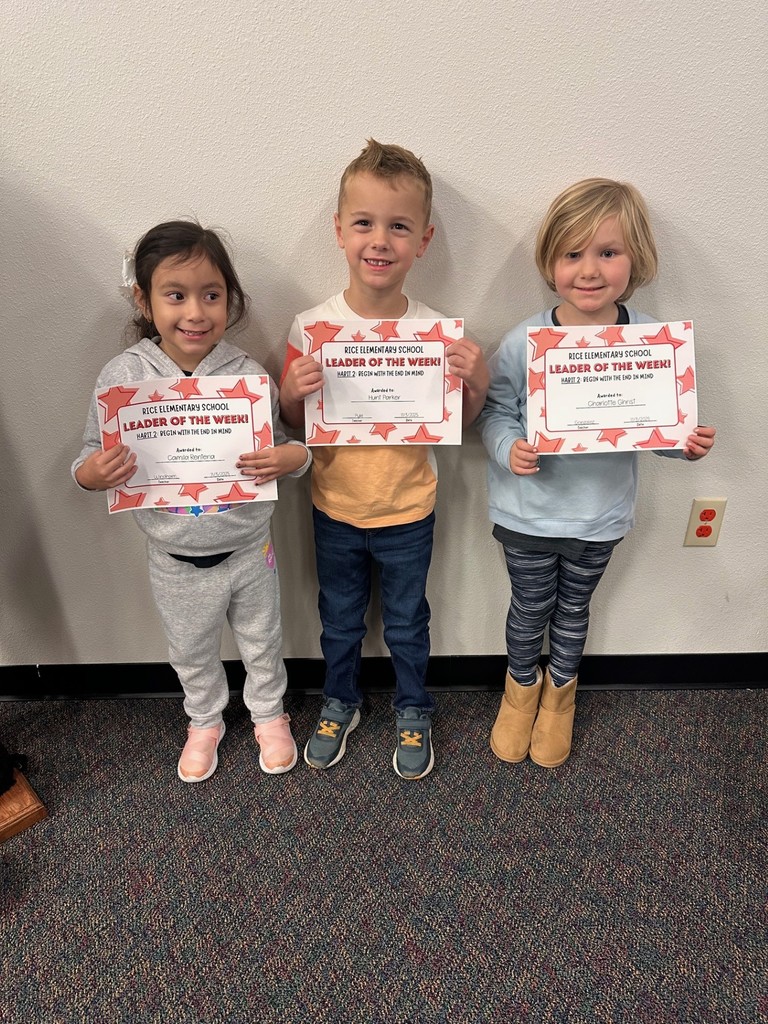 students holding certificates