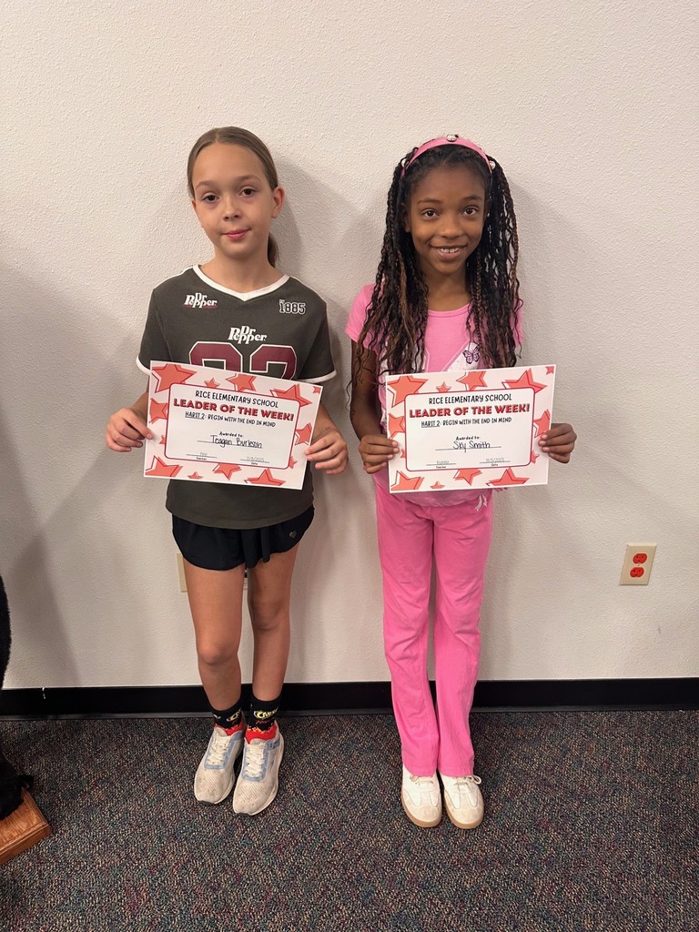 students holding certificates