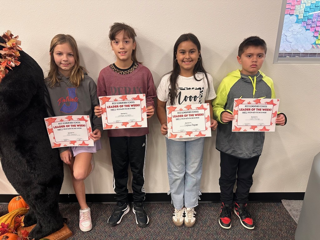 students holding certificates