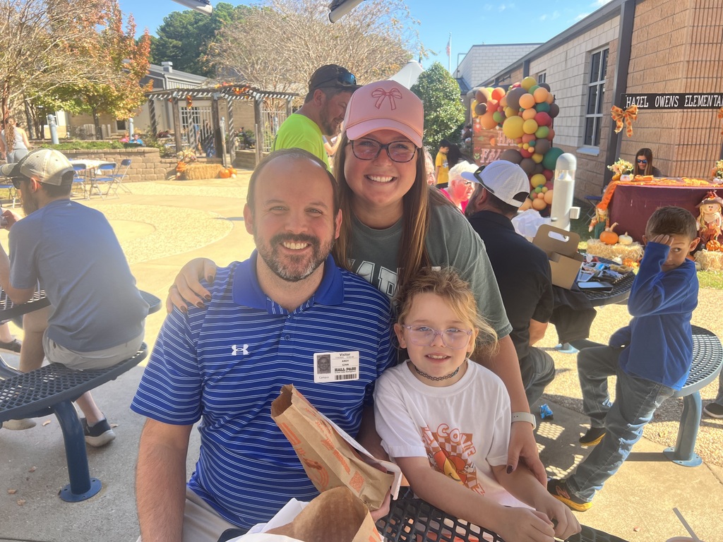 Parents eating with their student 
