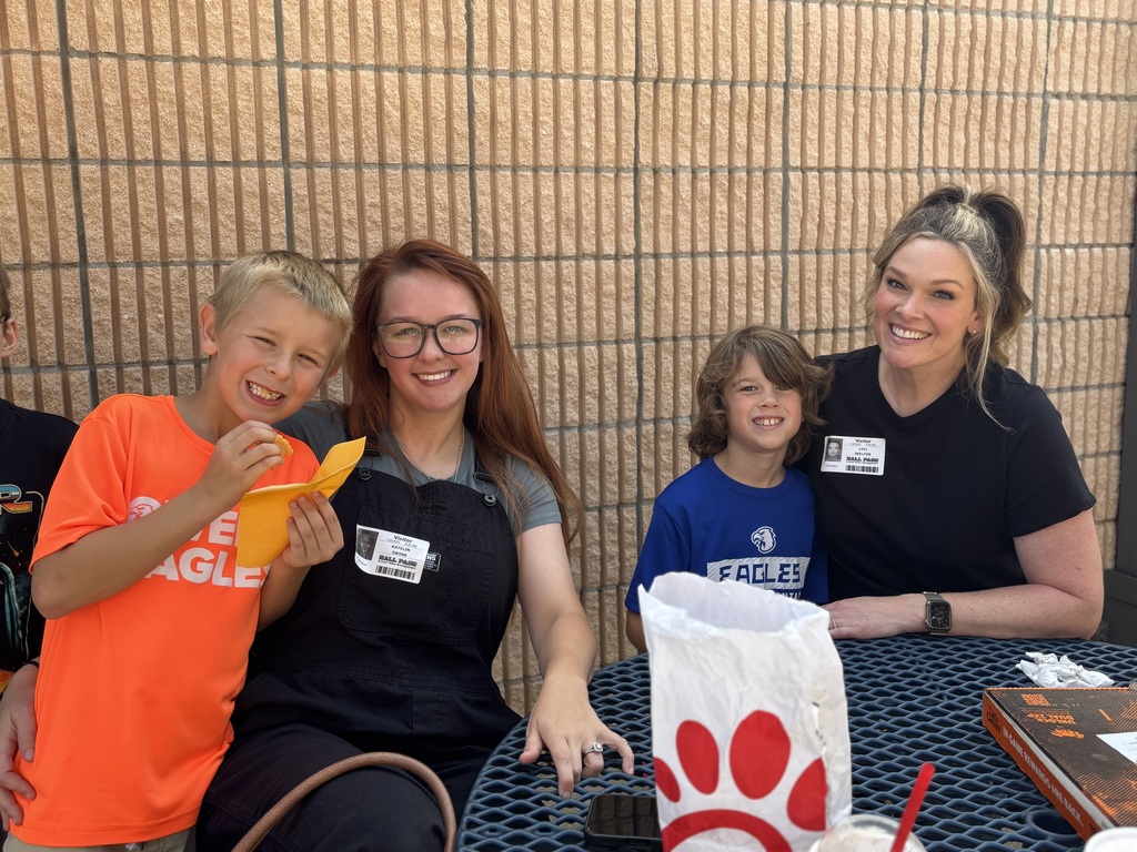 Parents eating with their student 