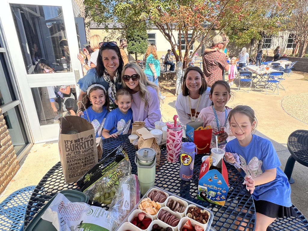 Parents eating with their student 