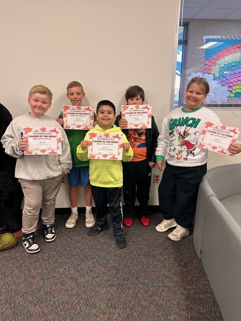 students holding certificates