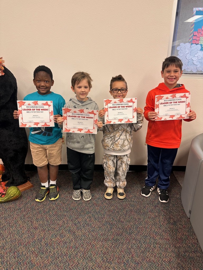 students holding certificates