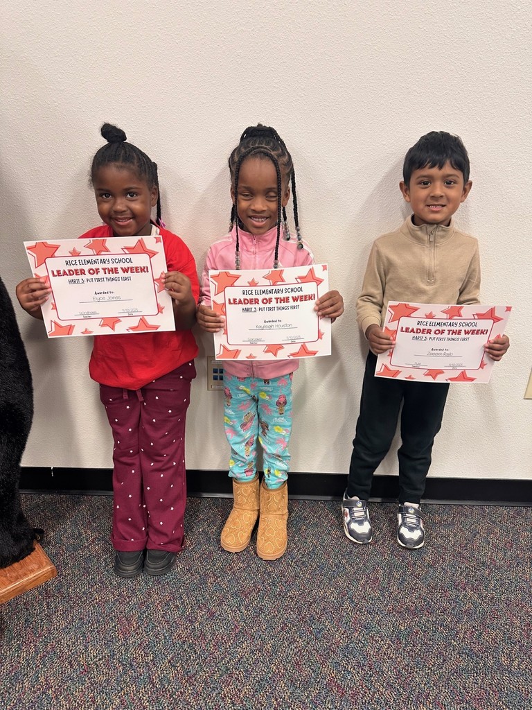 students holding certificates