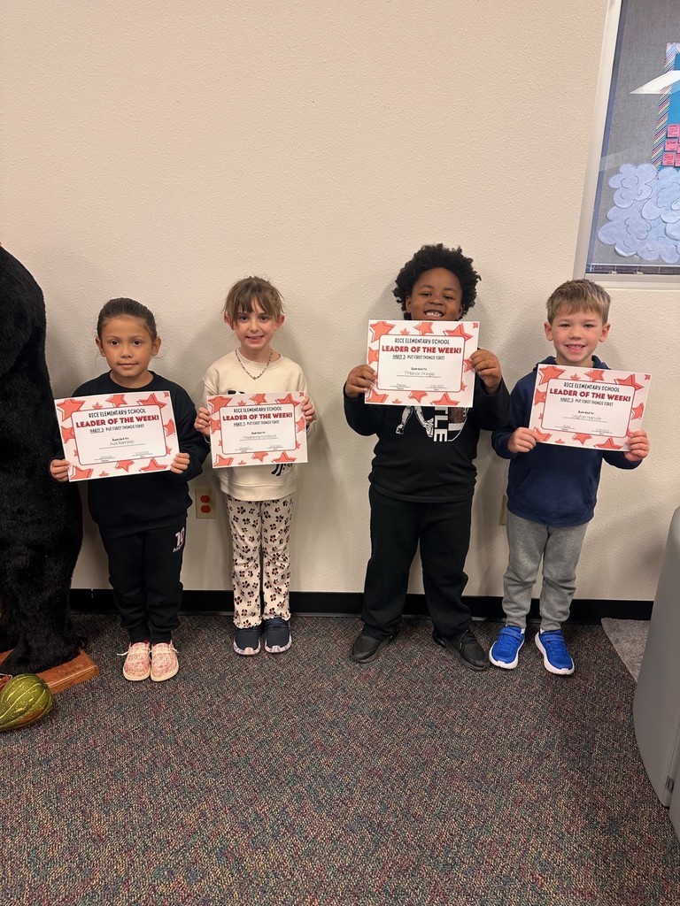students holding certificates
