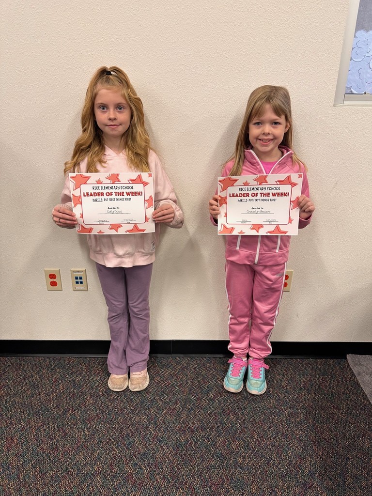 students holding certificates
