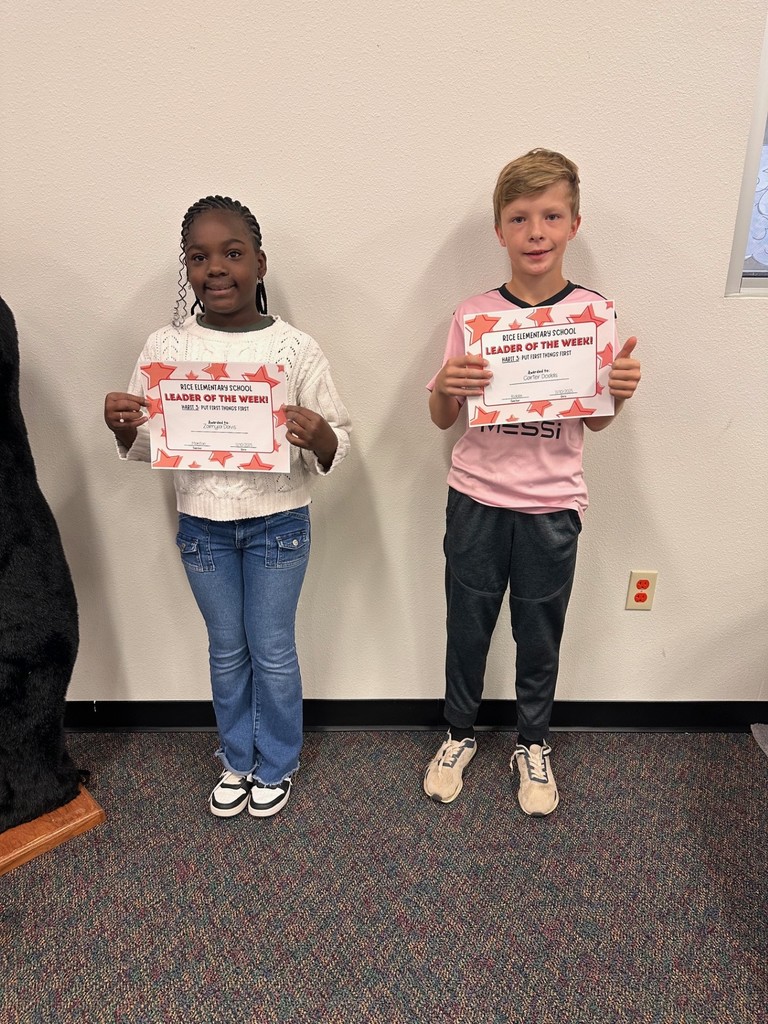 students holding certificates