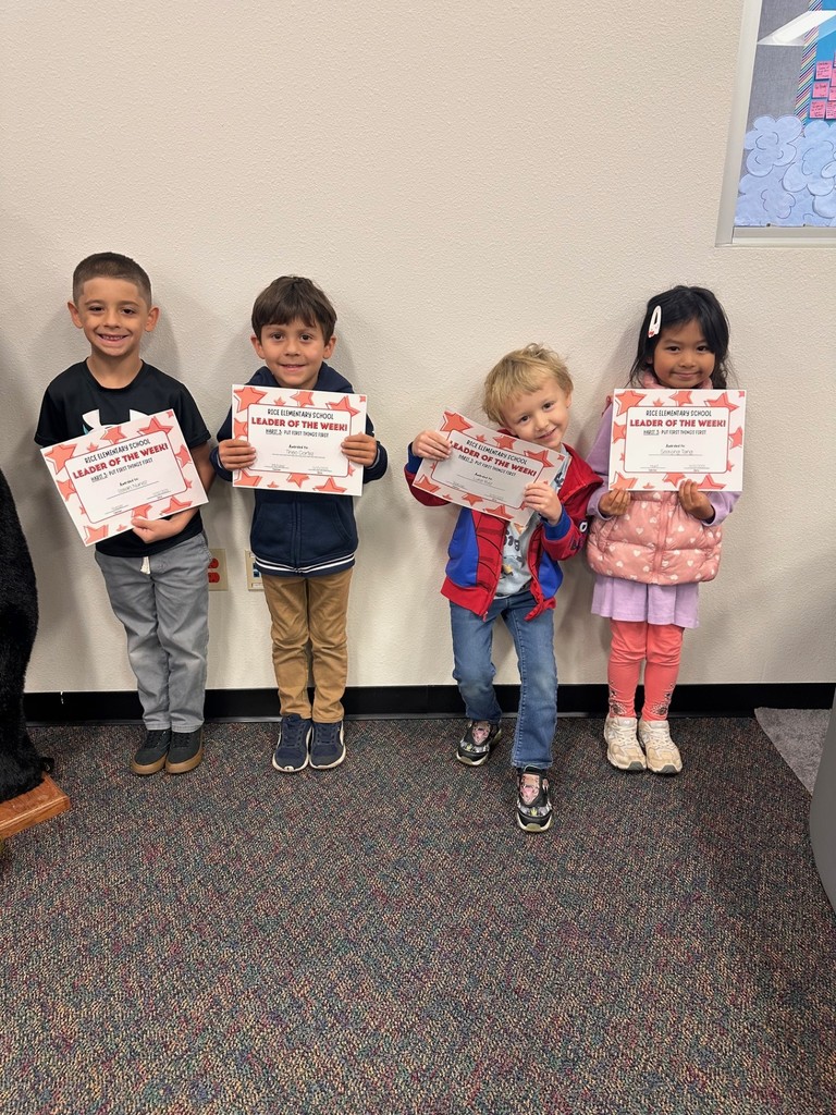 students holding certificates