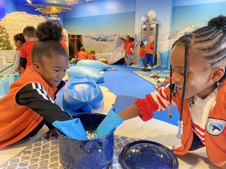 Kids exploring interactive exhibits.