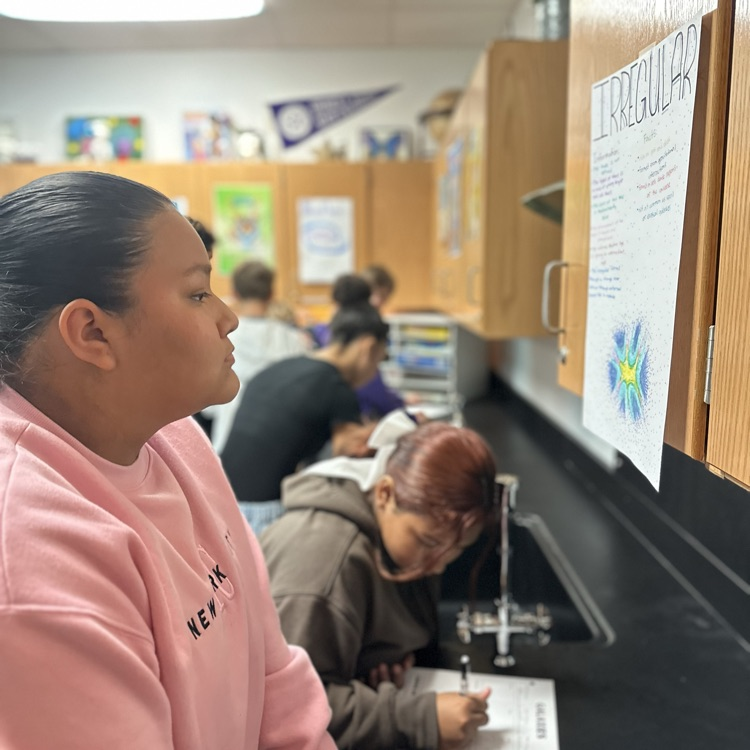 students making posters over galaxies