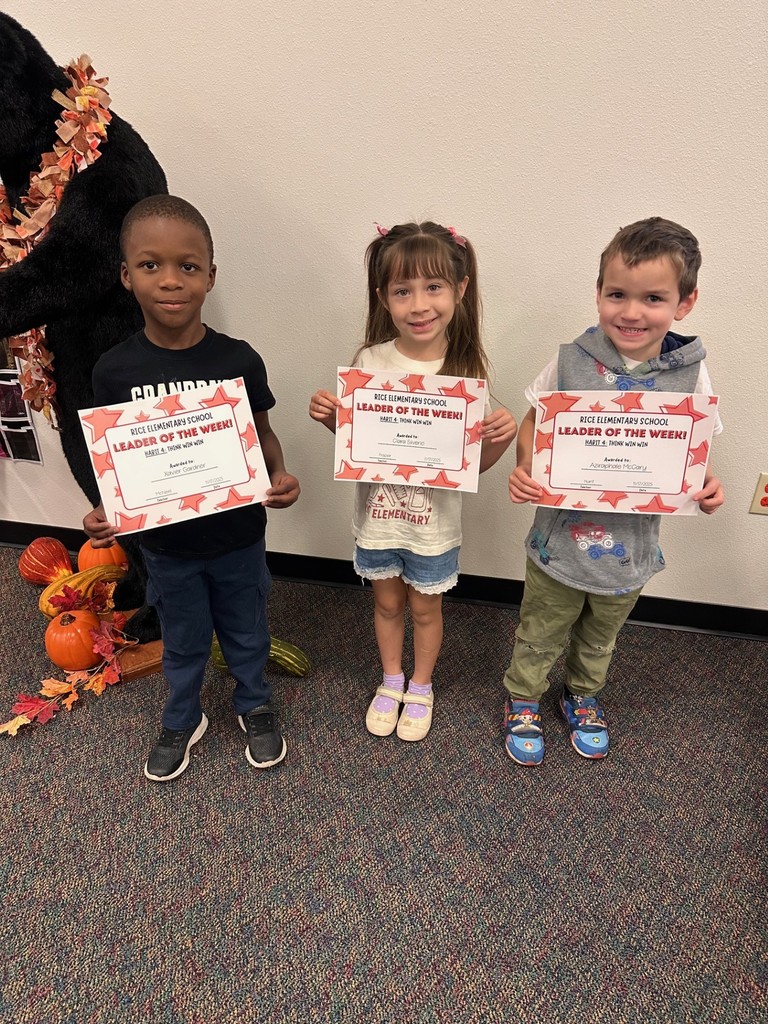 students holding certificates