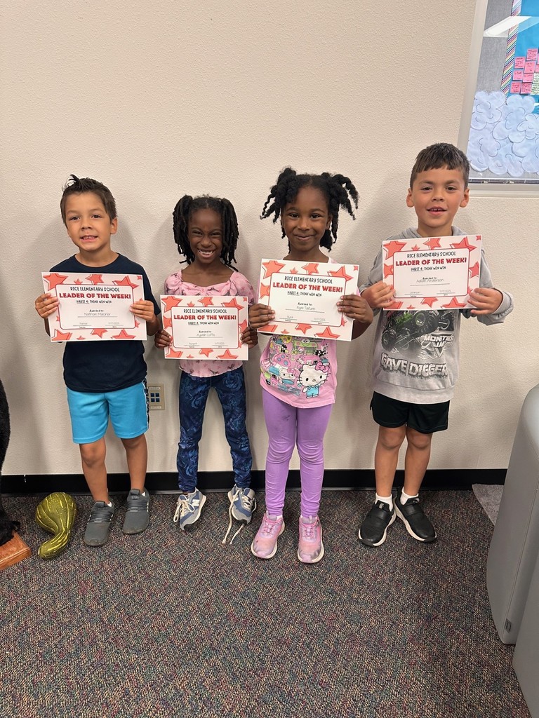 students holding certificates