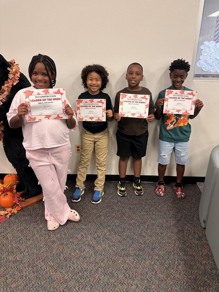 students holding certificates