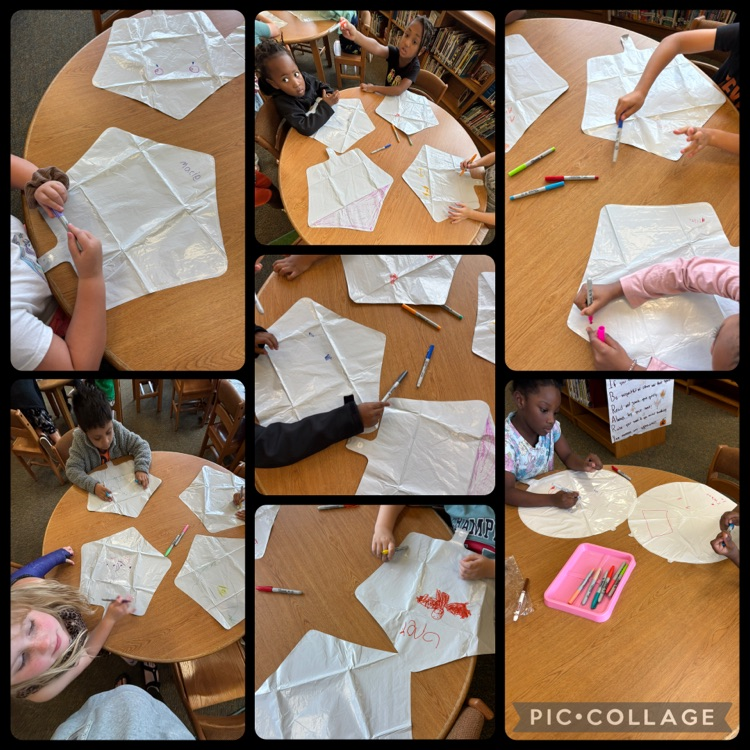 students making balloons in the library as an activity 