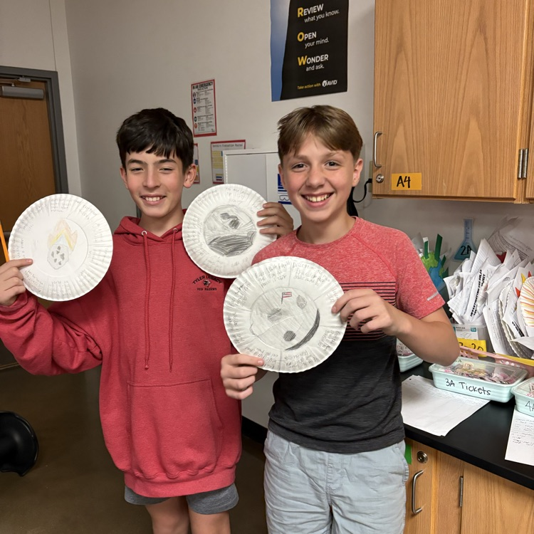 student holding project 