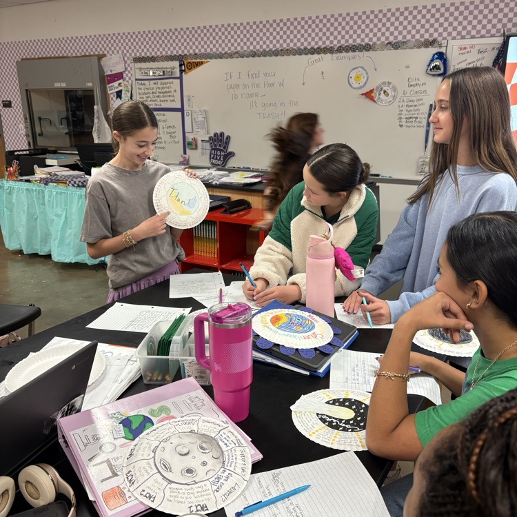 student holding project 