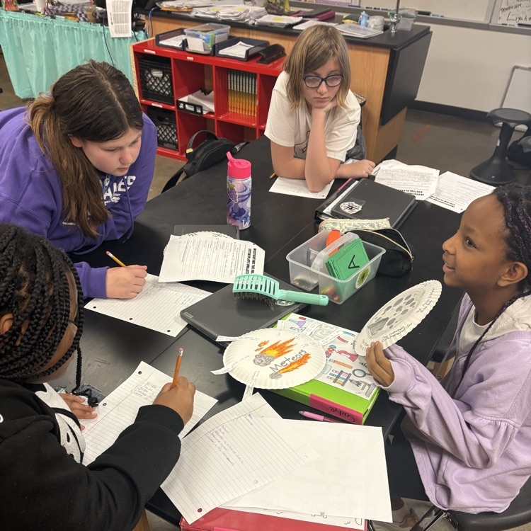 student holding project 