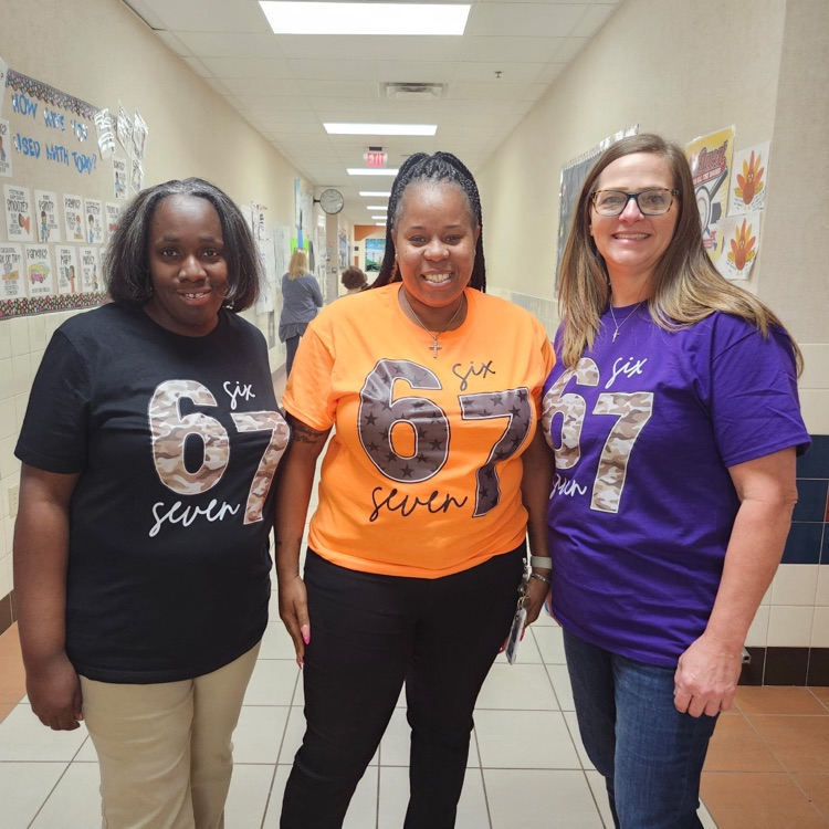 Staff members wearing shirts for 67 day