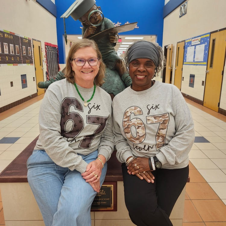 Staff members wearing shirts for 67 day