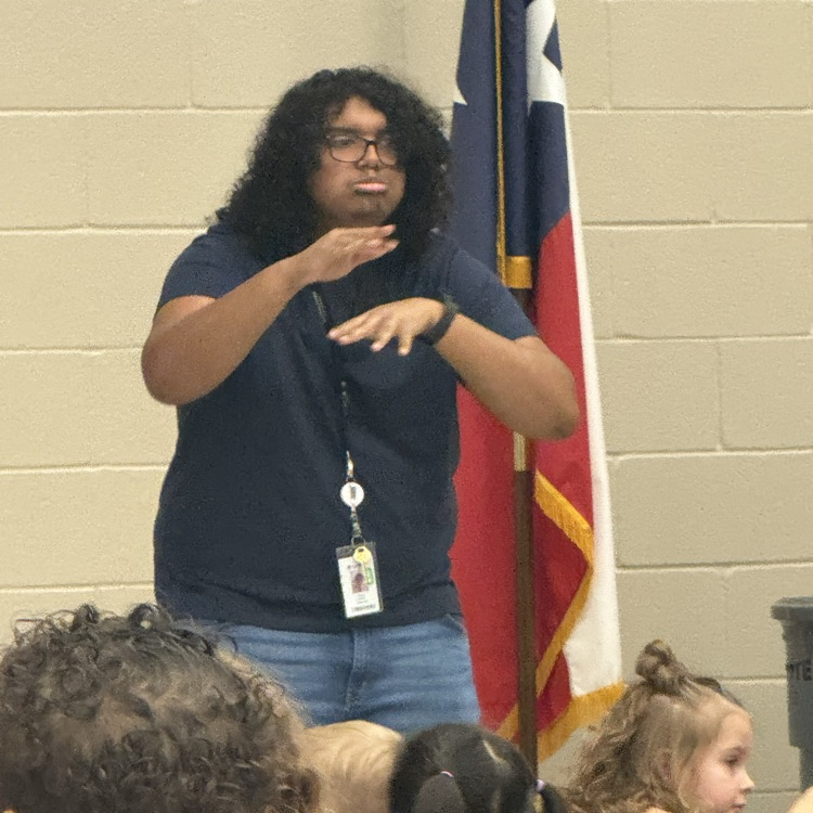 students watching a fairy tale play on stage in the cafe