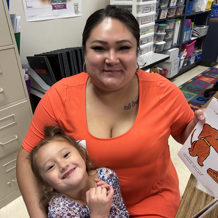 mom and daughter smiling during Thanksgiving feast 