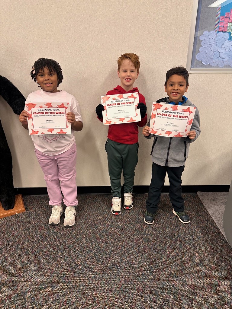 students holding certificates