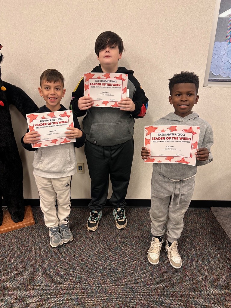 students holding certificates