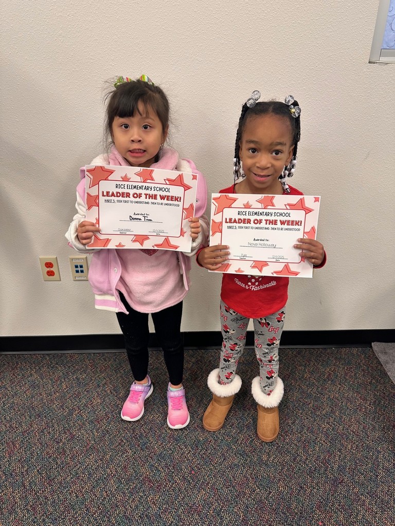 students holding certificates