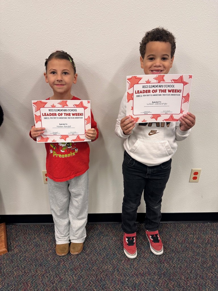 students holding certificates