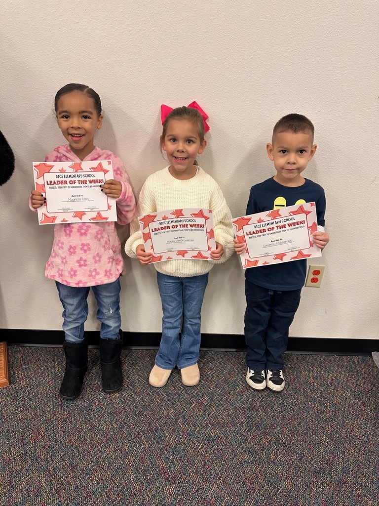 students holding certificates