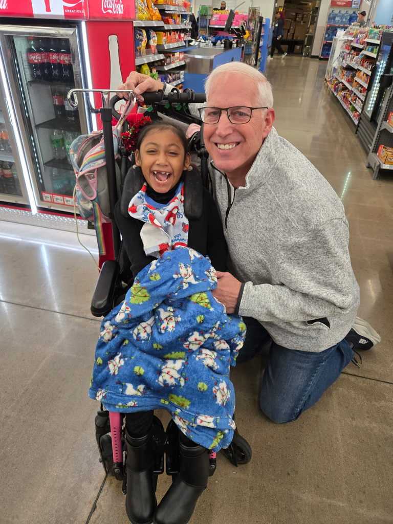 Boshears student smiles during this yearβs Mostyn Moreno Foundation Christmas Lights shopping excursion.