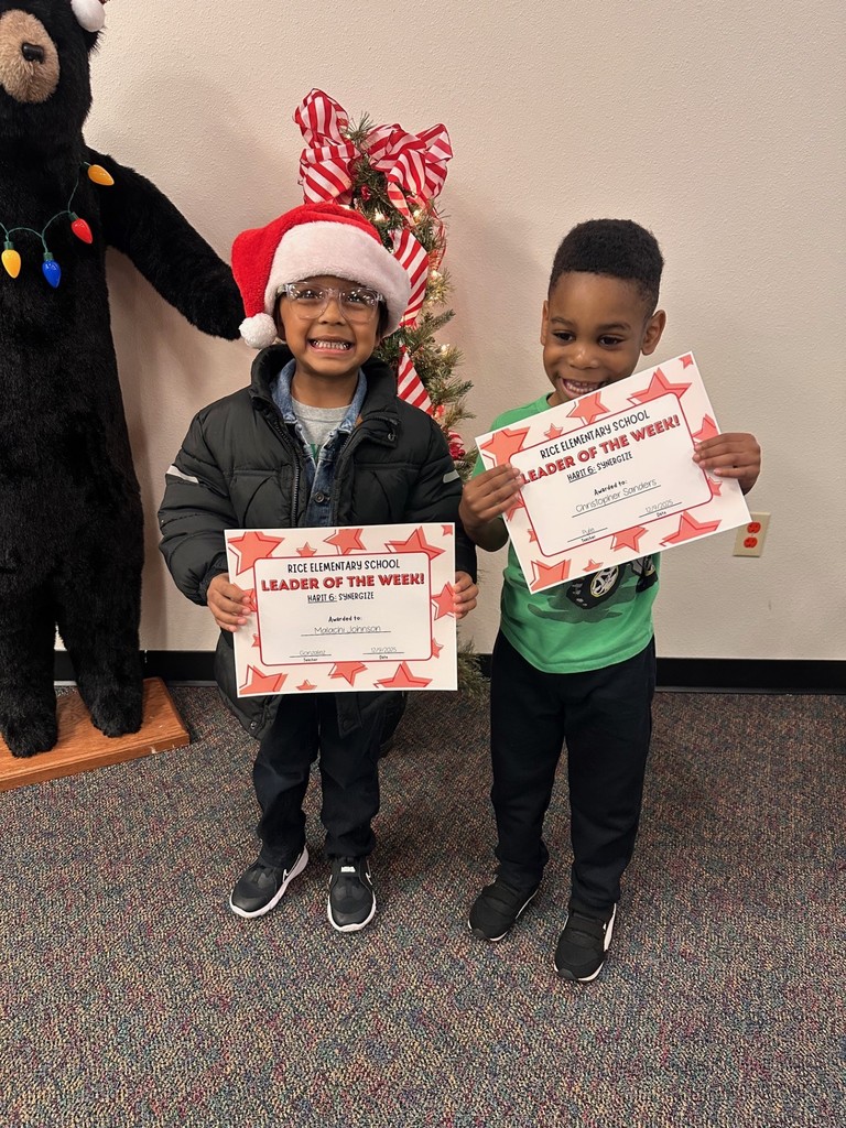 students holding certificates