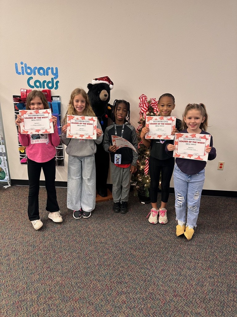students holding certificates