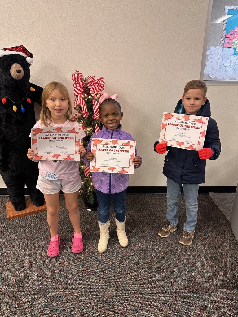 students holding certificates