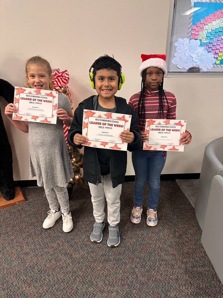 students holding certificates