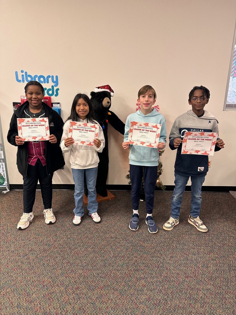 students holding certificates