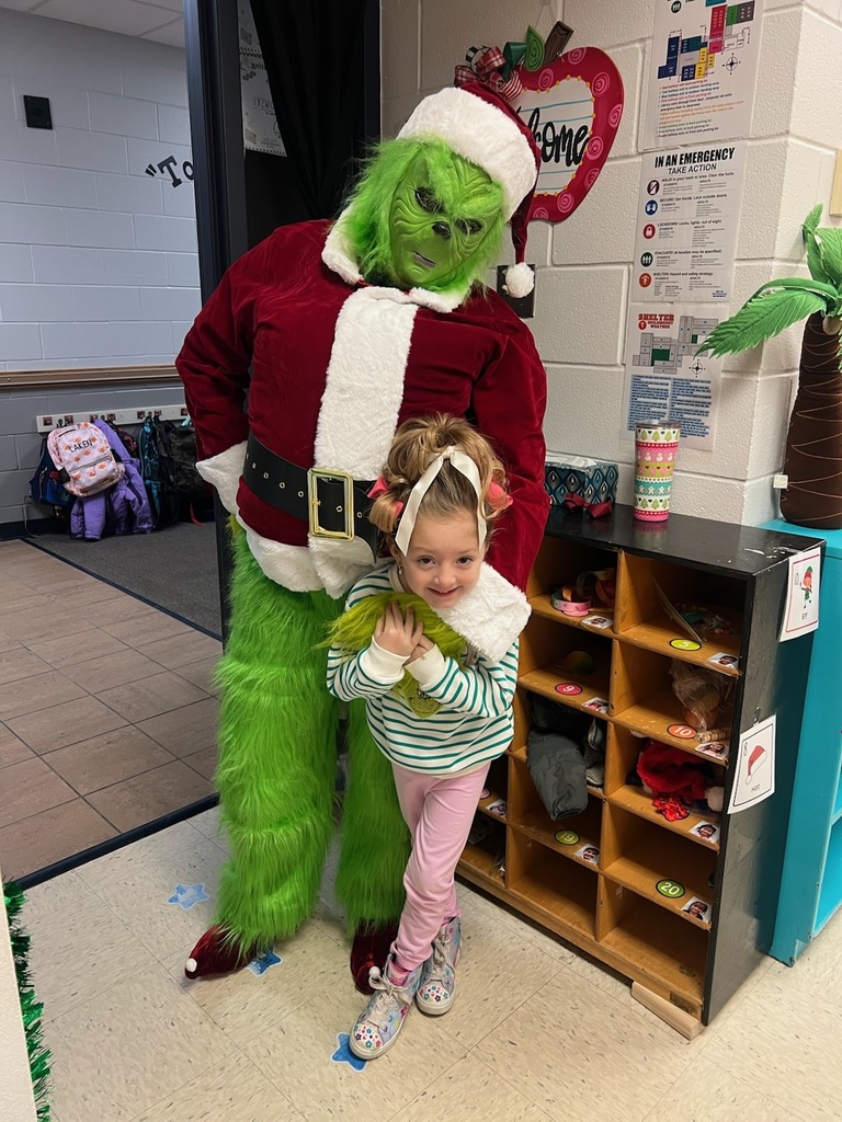 Grinch with student.