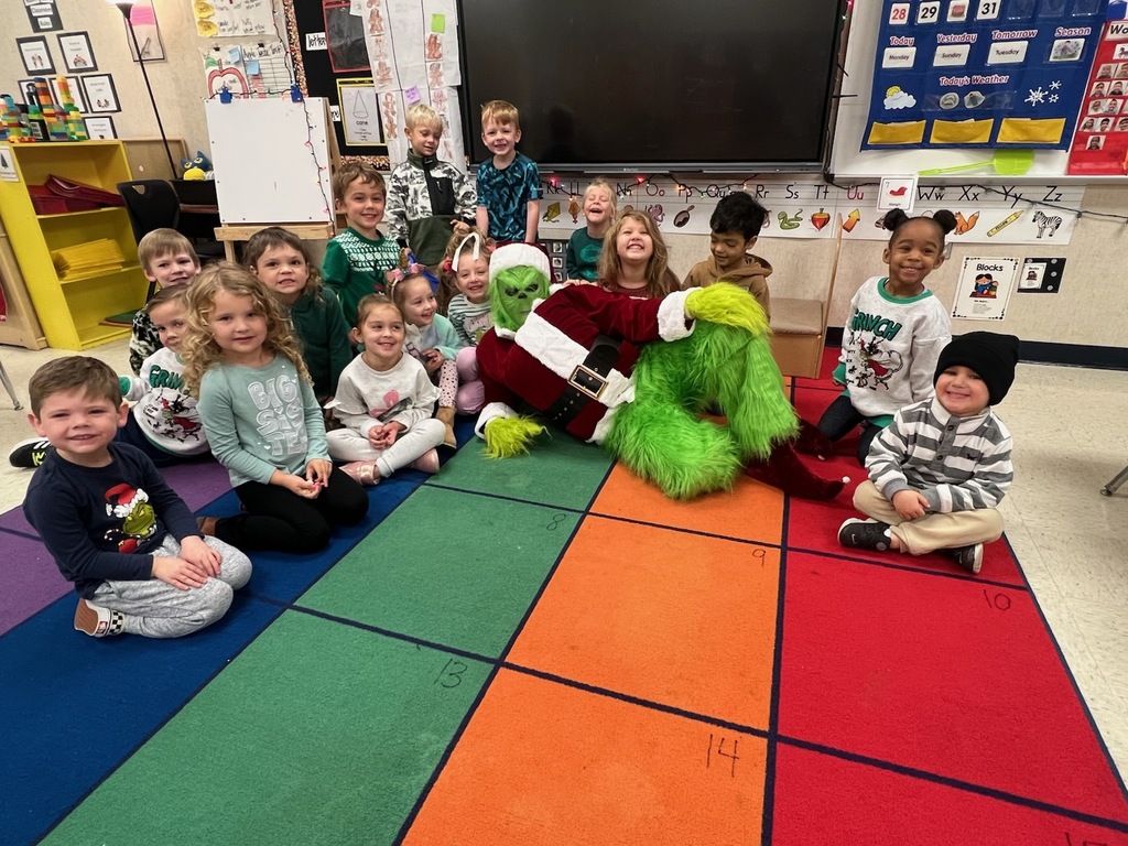 Grinch and students.
