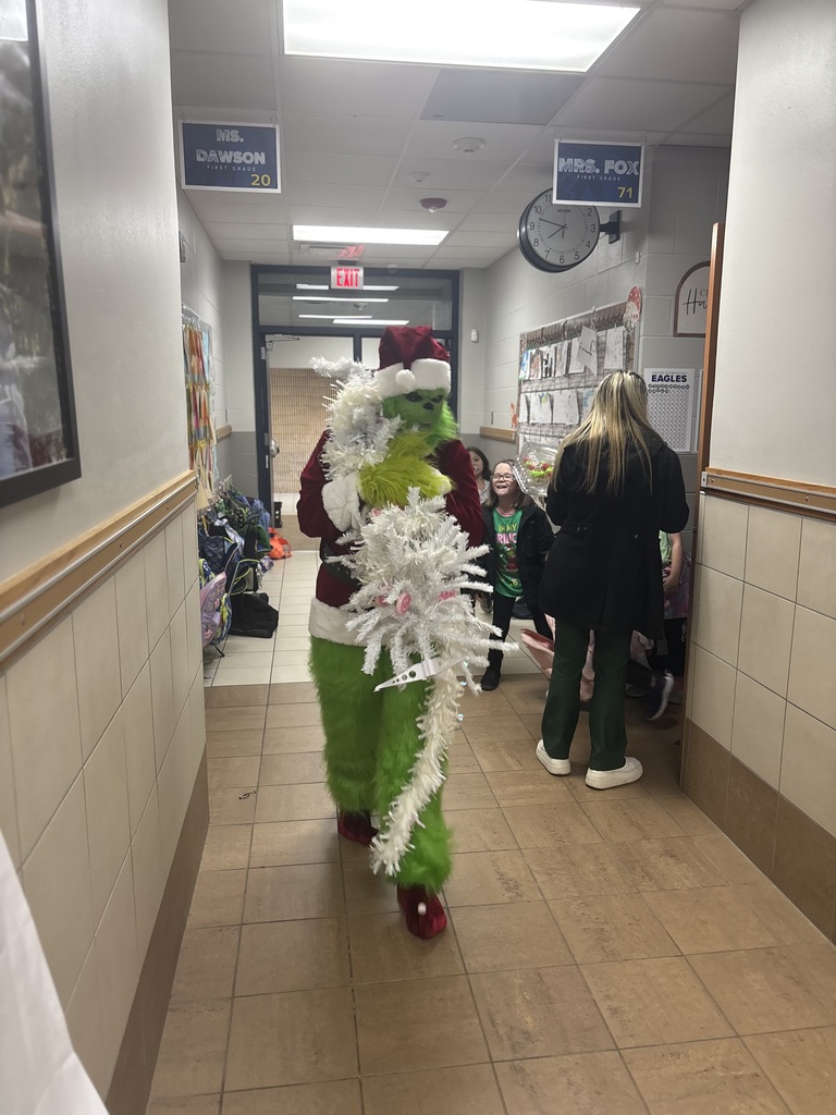 Grinch stealing Christmas tree.