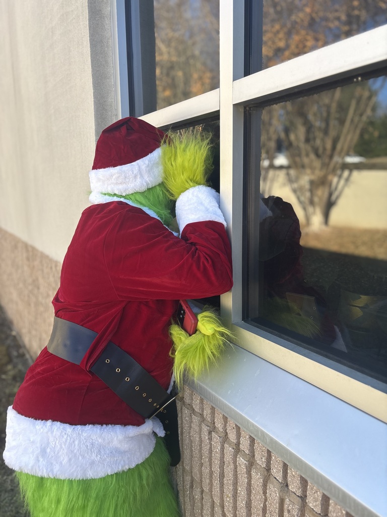 Grinch peaking in the window.